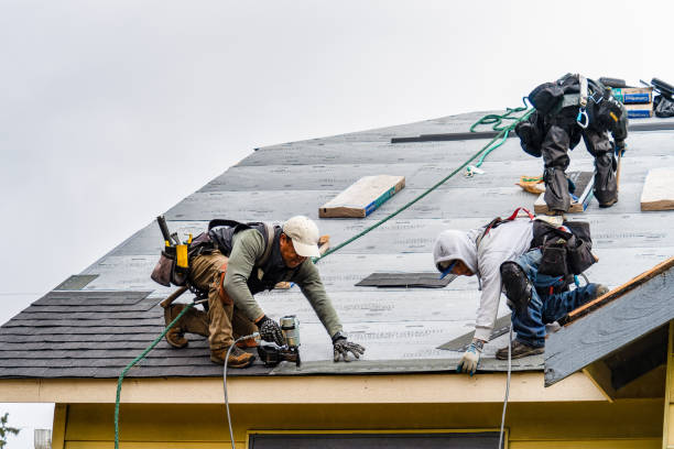 Professional Gutter Installation technician working in Gladstone, OR